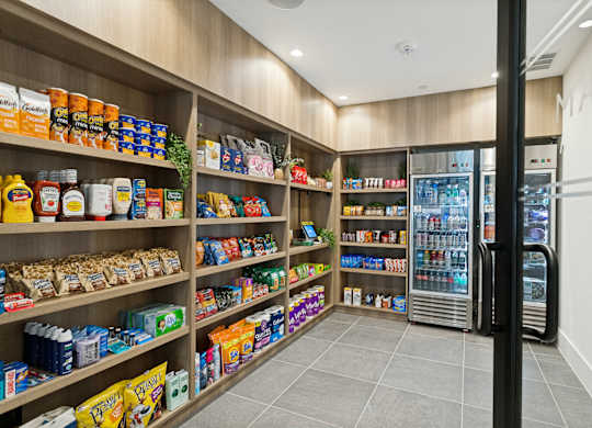 A well-stocked pantry with a variety of food items and drinks.