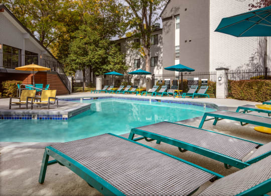 Clover Creek Apartments Pool Area and Lounge Chairs