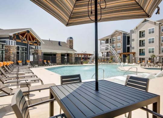 The Ranch at First Creek Apartments Shaded Seating Area by Swimming Pool