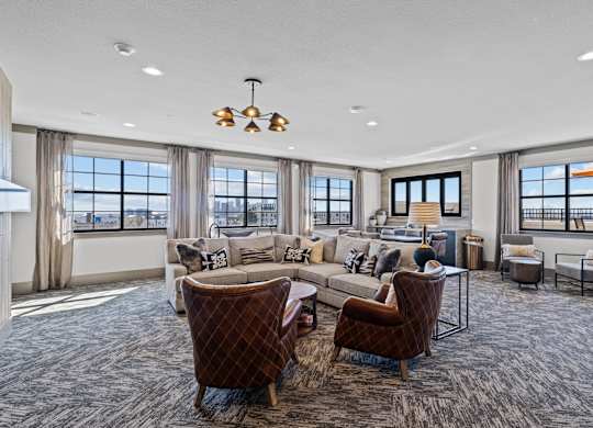 a living room with couches and chairs and a fireplace at Alton Jefferson Park, Denver, CO 80211
