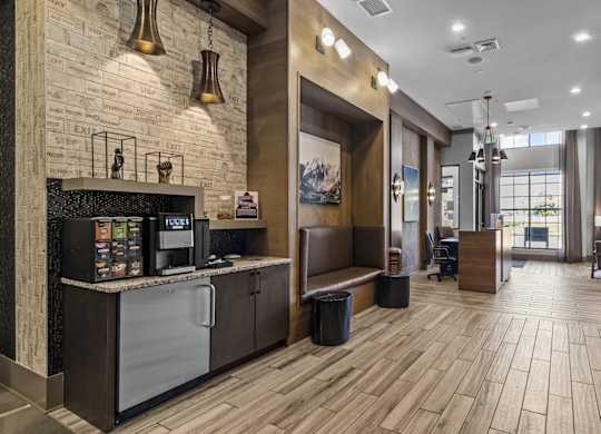 the lobby of a hotel with a reception desk and a coffee machine at Alton Jefferson Park, Colorado