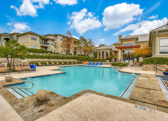 Hudson Miramont Apartments Pool with Lounge Chairs