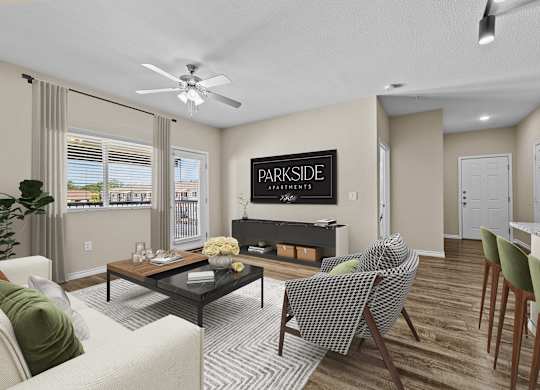 A living room with a sofa, chairs, and a coffee table.