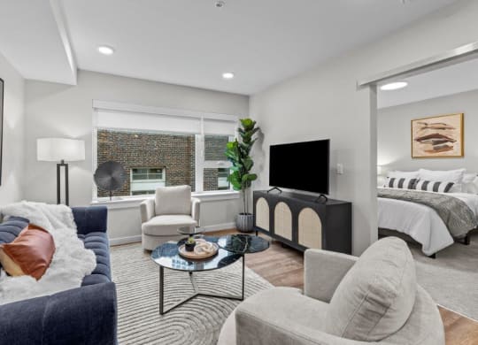 a living room with a couch and a television