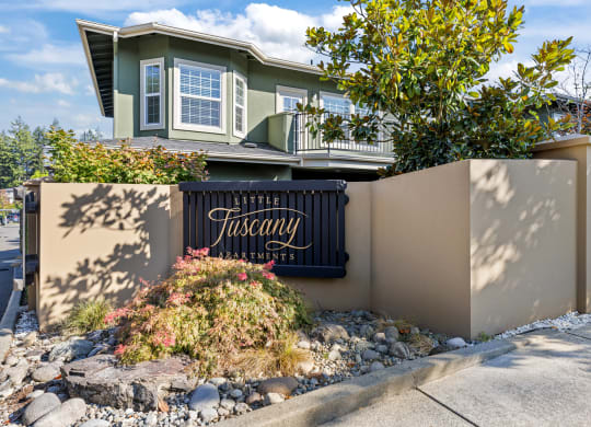 Little Tuscany Apartments & Townhomes - Townhome Exterior with Sign