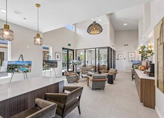 A well-lit waiting area with a reception desk and comfortable seating.