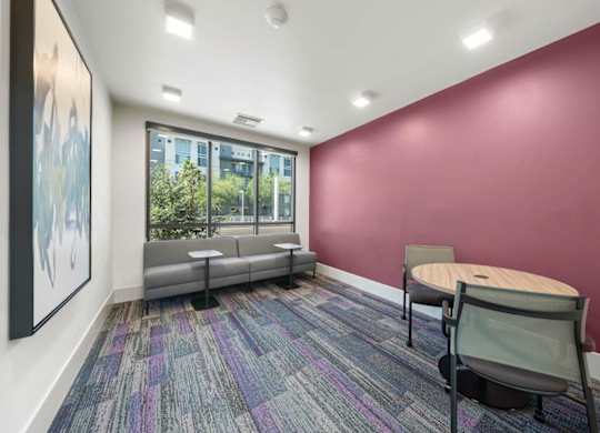 A work space with seating and tables