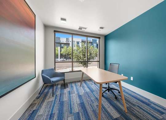 A small workspace with a desk and chair