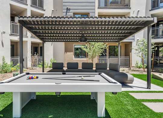 is set up outside on a green lawn.
