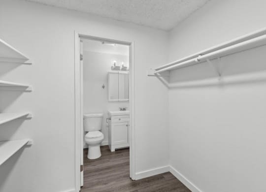 BRIX Apartments Bathroom with Attached Walk-In Closet
