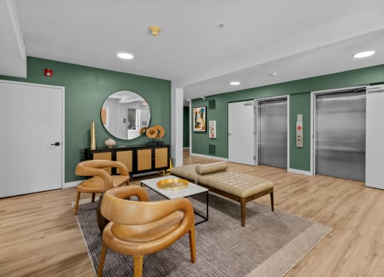 Resident lounge with seating area at Collins Circle apartments in the Goose Hollow district in Portland, Oregon.