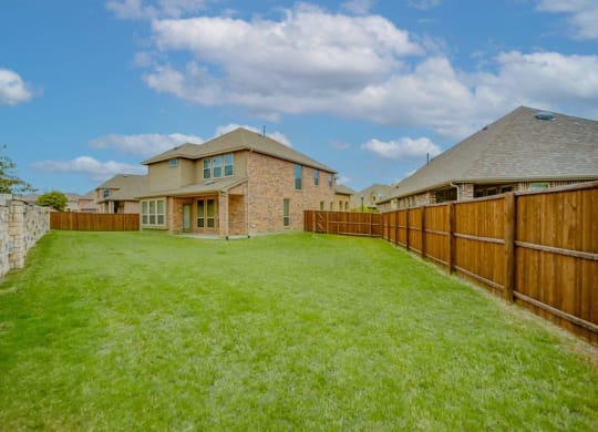 Cottages at the Realm Home Exterior and Private Yard