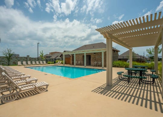 Cottages at the Realm Pool with Lounge Chairs
