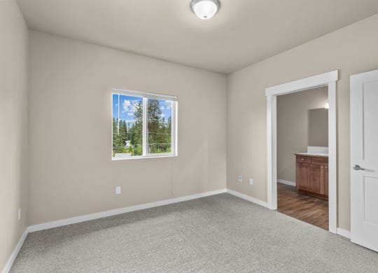 Dakota Flats Apartments in Spokane, Washington Bedroom with Attached Bathroom