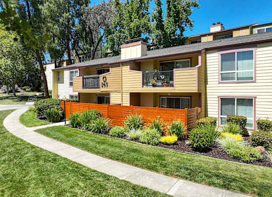 A sunny day at a well-kept apartment complex.