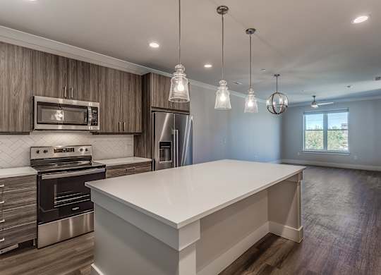 Kitchen with Island  at Discovery at The Realm, Lewisville