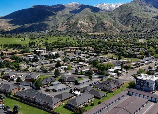 A small town with a mountain in the background.