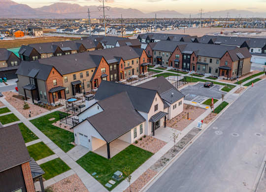 A residential area with houses and a road.