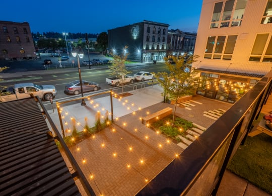 The Warren Apartments courtyard string lights at night