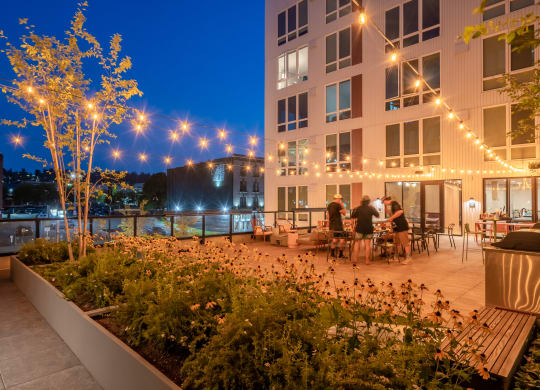 The Warren Apartments patio dining at night