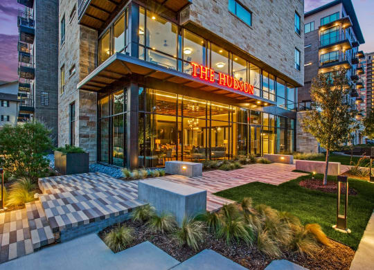 a photo of the outside of the fusion building at night