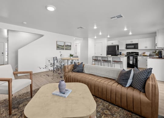 a living room with a couch and a table