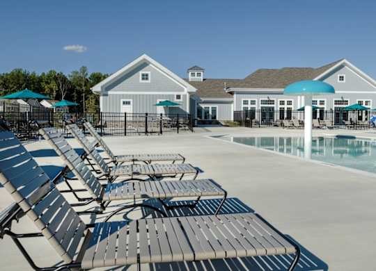 EVOLV at Stonehaven Townhomes in White Plains, Maryland Pool with Lounge Chairs