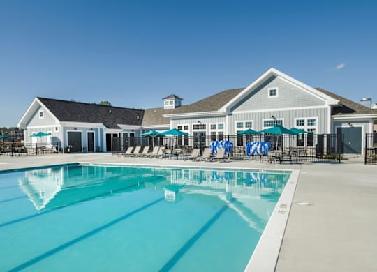 EVOLV at Stonehaven Townhomes in White Plains, Maryland Pool with Lounge Chairs