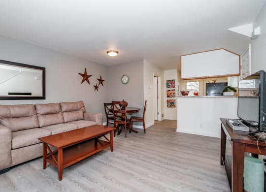 a living room with a couch and a table