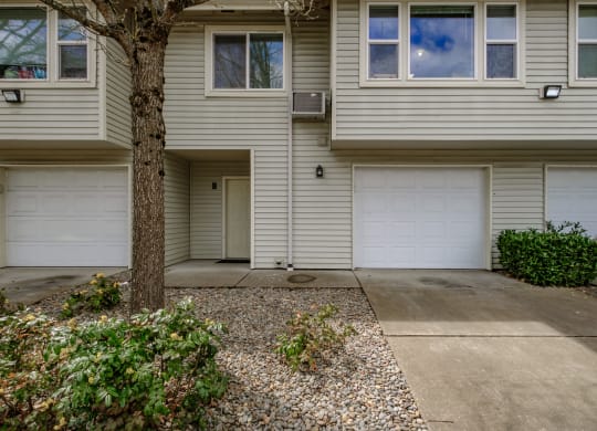 front of the house with two garages