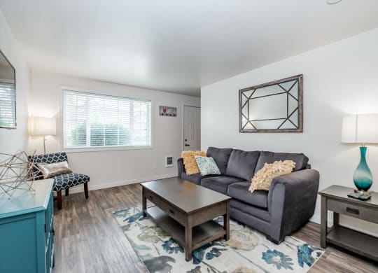 a living room with a couch and a coffee table