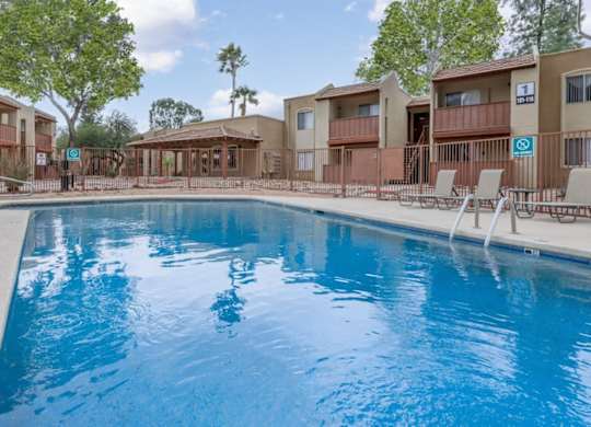 Fox Point Apartments in Tucson, Arizona Pool with Lounge Chairs