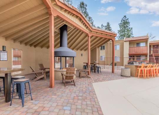 Fox Point Apartments in Tucson, Arizona Poolside Patio with Fire Pit