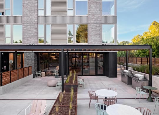 The Gabe Apartments in Portland, Oregon Patio with BBQ Grills and Fire Pit