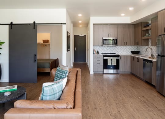 The Gabe Apartments in Portland, Oregon Model Living Room and Kitchen