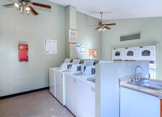 A laundry room with a washer and dryer.