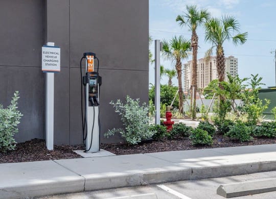 a parking meter on the side of the road
