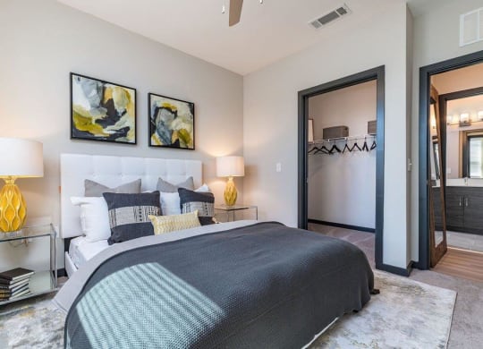 a bedroom with a bed and a closet