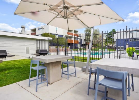 Hudson at Highline Apartments in Denver, Colorado Patio with BBQ's and Seating