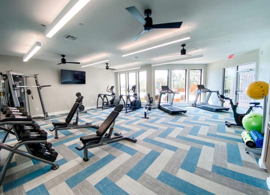 Fitness Center with Weights and Cardio Machines at Presidio at River East, Texas