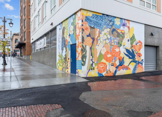 The Warren Apartments Exterior Sidewalk and Wall Mural
