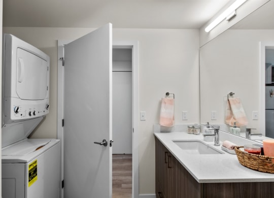 The Warren Model Bathroom with Washer and Dryer