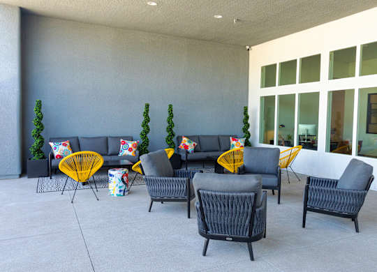 A set of outdoor furniture is arranged on a patio.