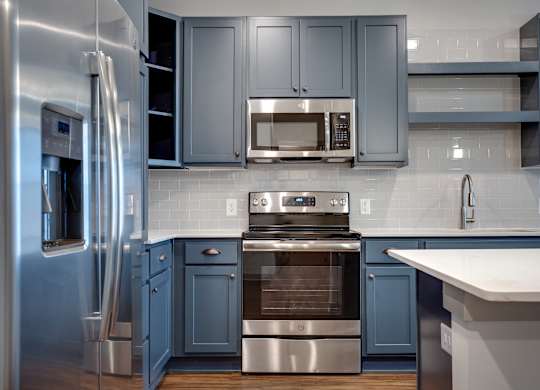 Alton Optimist Park Kitchen with Blue Cabinets