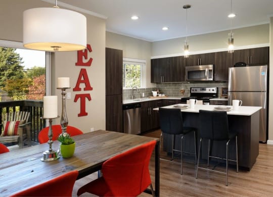 Latitude Apartments and Townhomes Model Kitchen and Dining Room