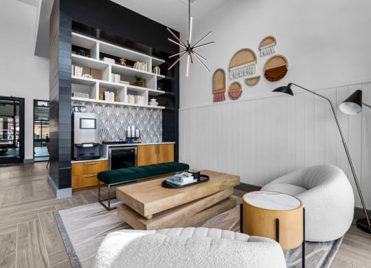 a living room filled with furniture and a large window