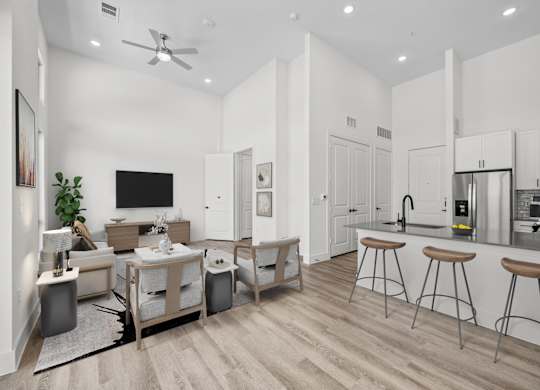 A modern living room with a bar area and a television.