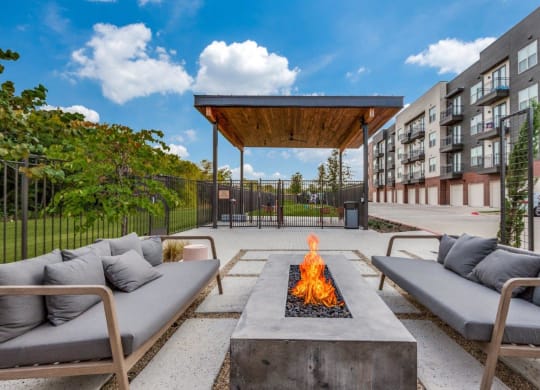 Lenox Cooper Apartments in Arlington, Texas Patio with Fire Pit and Seating