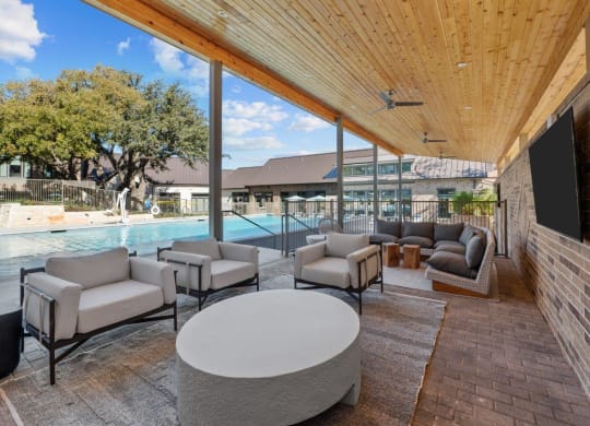 Covered Poolside Patio Lounge with Seating at Lenox Grand, Austin Texas