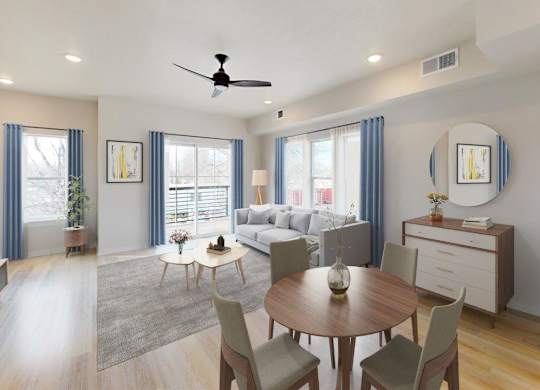 A modern living room with a dining table and chairs.